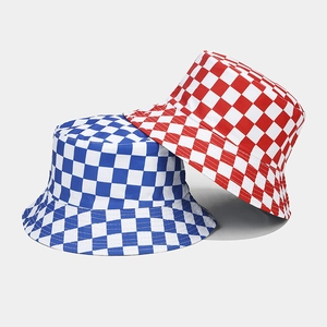 Reversible checkerboard bucket hats in blue and red patterns for sun protection