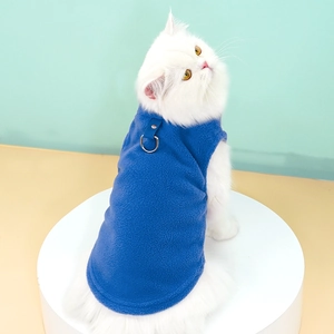 Blue fleece cat harness vest with metal D-ring shown on a white cat, back detail view