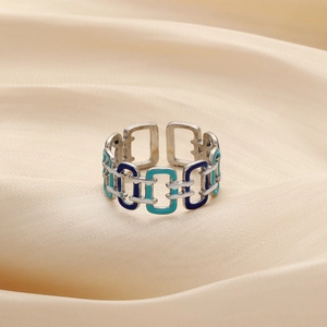 Elegant adjustable square link ring with blue and white enamel on silk background