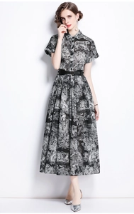 Detailed view of the lapel collar and French Toile de Jouy tiger print on the dress