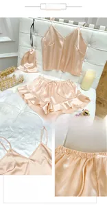 Three-piece champagne silk pajama set including V-neck camisole and ruffled shorts