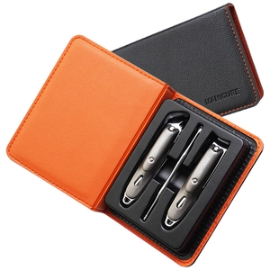 Professional 3-piece stainless steel manicure set in a black and orange leather case