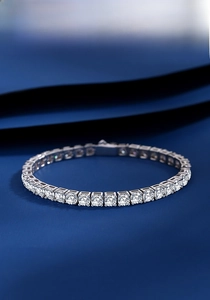 Macro detail of S925 sterling silver tennis bracelet with brilliant-cut moissanite stones