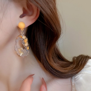 Minimalist resin geometric irregular earrings with translucent yellow stone and gold trim
