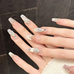 Sparkly pink star press-on nails with luxury crystal rhinestones and white french gradient