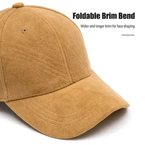 Brown suede baseball cap with a wide curved brim and reinforced stitching