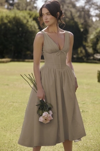Detail of V-neck khaki maxi dress featuring cinched waist and flowing A-line skirt