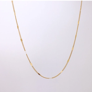 Detailed macro view of 18k gold-plated stainless steel oval link chain necklace for women
