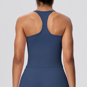Detailed back view of navy blue racerback sports bra and high-stretch yoga leggings set