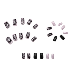 Short square leopard print nails in purple and black with glitter finish for women