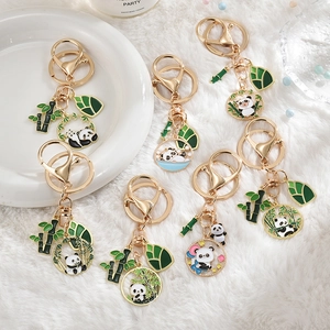 Cute panda and bamboo metal keychain set with gold finish and enamel charms for bags