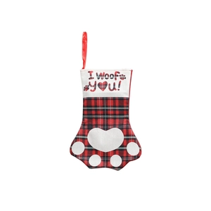 Christmas dog paw stocking with red and black buffalo plaid and I Woof You print