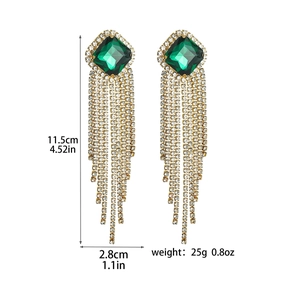 Detail view of long crystal tassel earrings with green square gemstone and dimensions