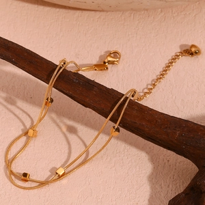 Double-layer 18K gold plated stainless steel anklet featuring cubic beads on a snake chain
