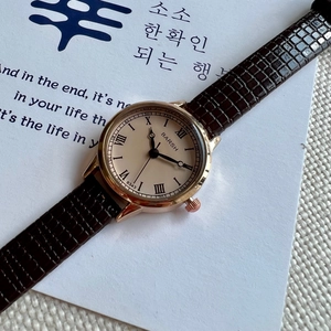 Elegant BARSH women's quartz watch with roman numerals and brown crocodile leather strap