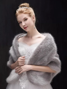 Detail of grey faux fur bridal shawl showing soft plush texture and elegant evening wrap style
