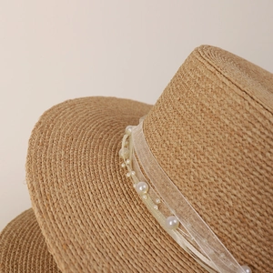 Premium raffia straw hat with pearl ribbon decoration for women's summer sun protection