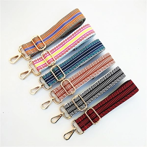 Adjustable ethnic style crossbody bag straps with geometric patterns and gold metal hooks