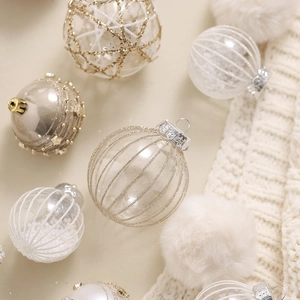 Champagne and white Christmas ball ornaments set with glitter patterns for holiday decor