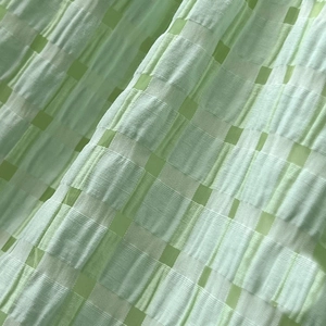 Mint green checkered fabric detail shot, perfect for custom bag making, fresh and stylish texture.