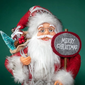 Classic Santa Claus doll figure with red white fabric outfit and mini Christmas tree accessory