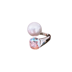 Adjustable silver ring with round white pearl and square pink crystal in a minimalist style