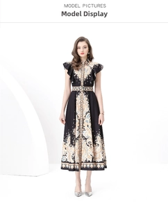 Detail of bohemian floral print and waist-tie design on a long black dress