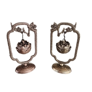 Chinese vintage hanging lotus incense burner in bronze and copper finish with crane frame