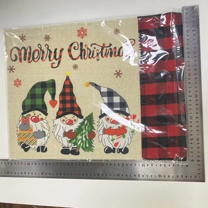 Close-up of a 45x45cm Merry Christmas pillow cover with red plaid and gnome design