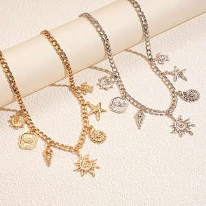 Vintage metal chain necklace with sea star, conch and turtle pendants for women