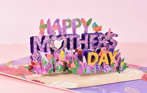 Macro shot of 3D Mother's Day popup card featuring floral Happy Mothers Day text
