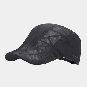 Detail of black breathable duckbill cap featuring mesh panels and sports logo print