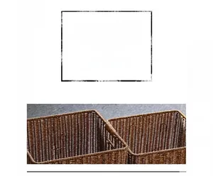Detail of hand-woven dark brown storage baskets with ergonomic cutout side handles