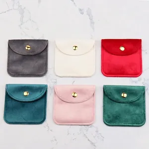 Velvet jewelry pouches with gold metal snaps in six assorted colors set for storage