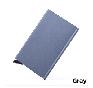Detailed macro of a dark grey RFID aluminum card case with manual sliding switch