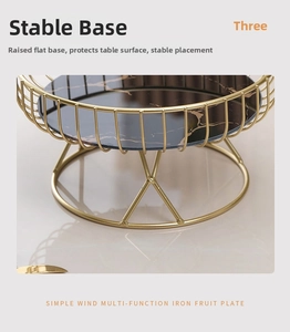 Detail of steady golden iron frame with reinforced base on luxury glass fruit tray