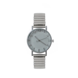 Detail view of silver elastic metal watch band and minimalist retro dial with artistic fonts