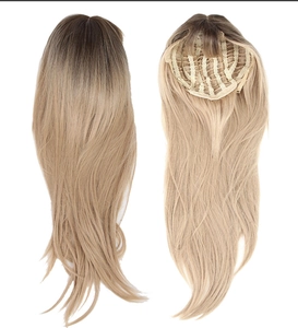Detail of ombre brown to blonde long wavy wig showing internal rose net and adjustable straps