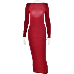 Detail of red glitter dress featuring sparkling fabric texture and off-shoulder long sleeves