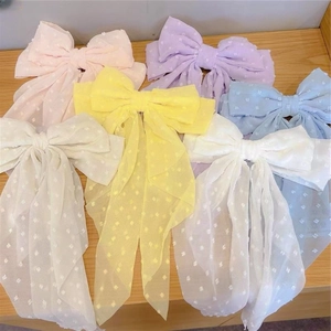 Large chiffon bow hair clips in pastel macaron colors with polka dot jacquard texture