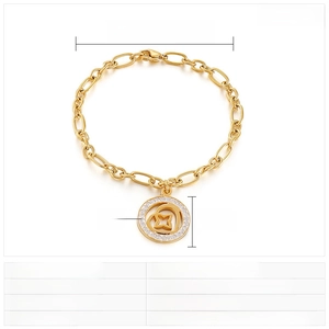 Detailed view of golden stainless steel chain bracelet with crystal star pendant measurements