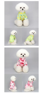 Detail view of small dog fleece hoodies with lemon and strawberry cartoon prints