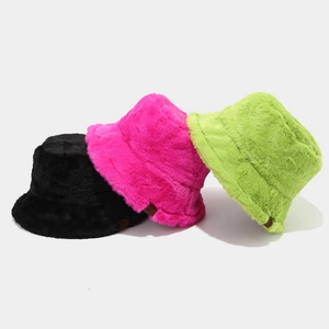 Plush faux fur bucket hat with snowflake leather patch in black, pink and green