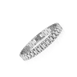 Detailed close-up of a wide silver stainless steel bracelet with watch-style links