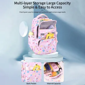 Pink ergonomic school backpack for girls with rainbow prints and multi-layer storage