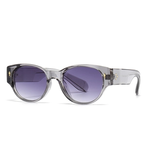 Chic round sunglasses with grey transparent frames, gradient purple lenses and gold studs