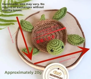 Detailed view of hand-crocheted turtle coaster with dimensions of 17cm by 12cm