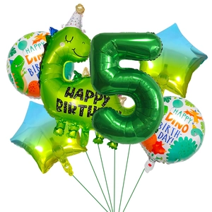 Detail of dinosaur-themed 5th birthday balloon set with green foil number five and stars