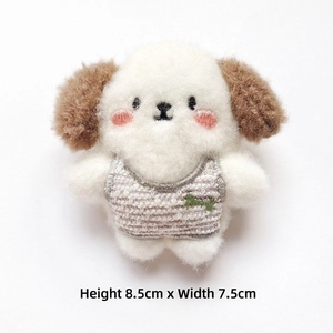 Detail shot of a small white plush puppy with size specs of 8.5cm height and 7.5cm width