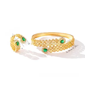 Detail view of gold zircon jewelry set showing precise bracelet and ring dimensions